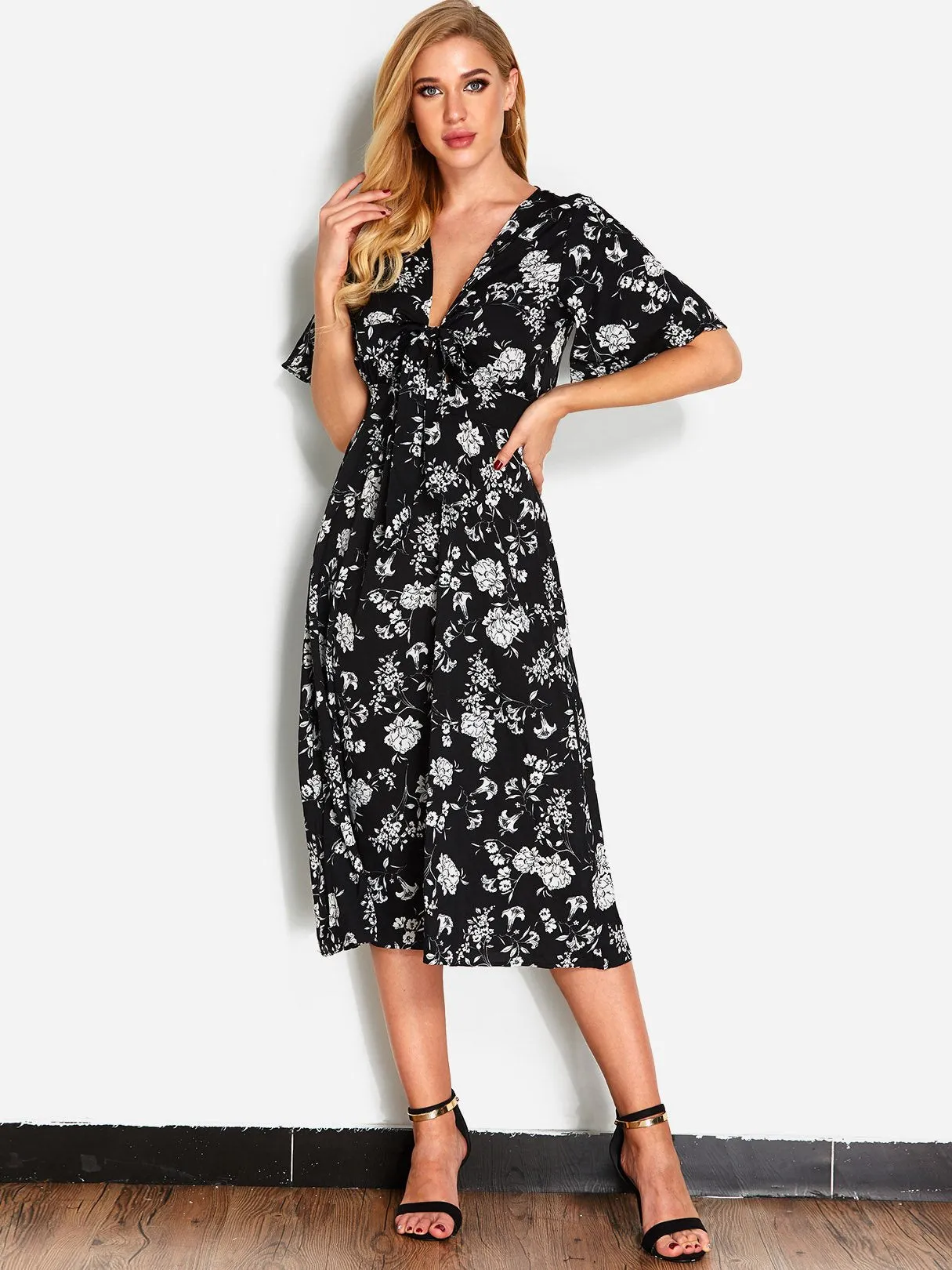 Wholesale Black Deep V Neck Half Sleeve Floral Print Dresses